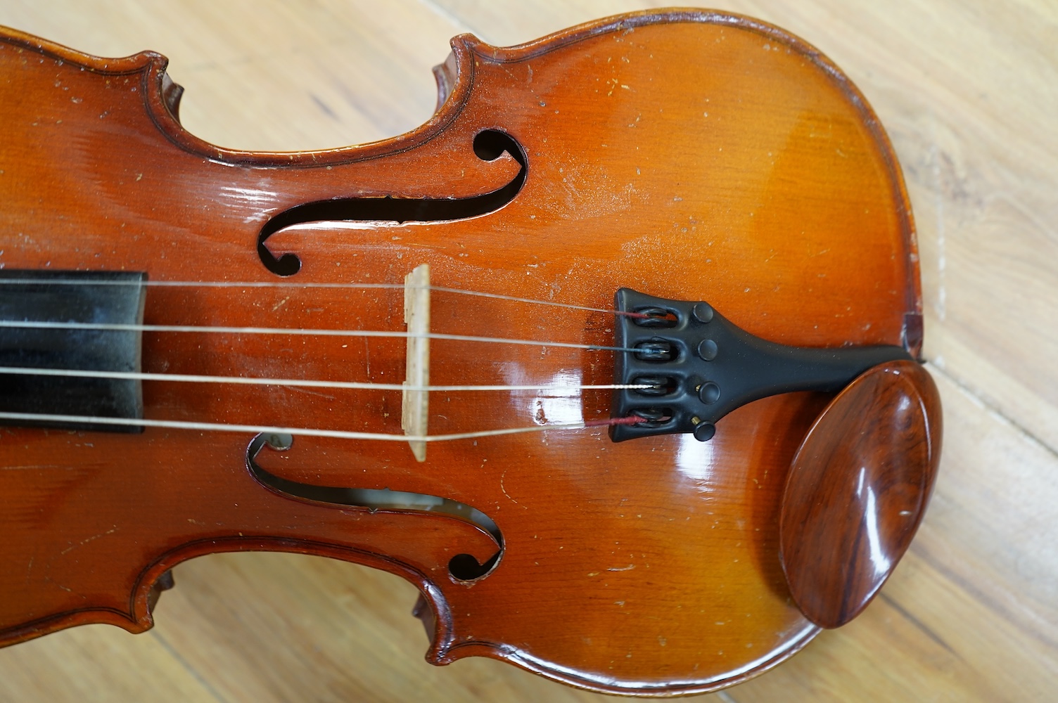 A cased Chinese viola, with makers label inside body which reads; ‘Made in Canton China’, body length 41cm. Condition fair to good.